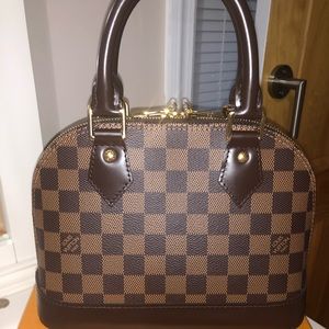 Authentic Louis Vuitton Alma bb damier.